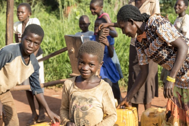 Women and children getting water in South Sudan